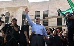 Ismail Haniyeh waves to supporters during a Hamas rally in Gaza (photo credit: Ahmad Khateib/Flash90)