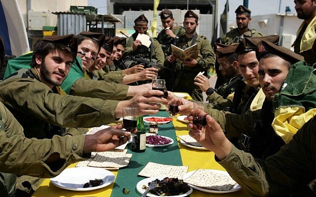 Golani soldiers during a Passover meal (photo credit: Edi Israel/Flash 90) Golani soldiers during a Passover meal (photo credit: Edi Israel/Flash 90)