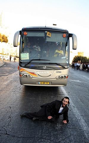 An ultra-Orthodox man protests against violations of the Sabbath, Jerusalem (photo credit: Matanya Tausig/Flash90)