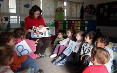 Kindergarten children in their classroom (illustrative photo; credit: Edi Israel/Flash90)
