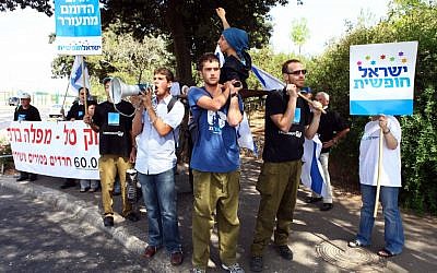 Dozens of reserve soldiers protesting against the Tal Law in front of the Knesset in 2011. (photo credit: Abir Sultan/Flash90) Dozens of reserve soldiers protesting against the Tal Law in front of the Knesset in 2011. (photo credit: Abir Sultan/Flash90)