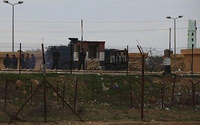 Egyptian soldiers stand along the border with Israel (photo credit: Tsafrir Abayov/Flash90)