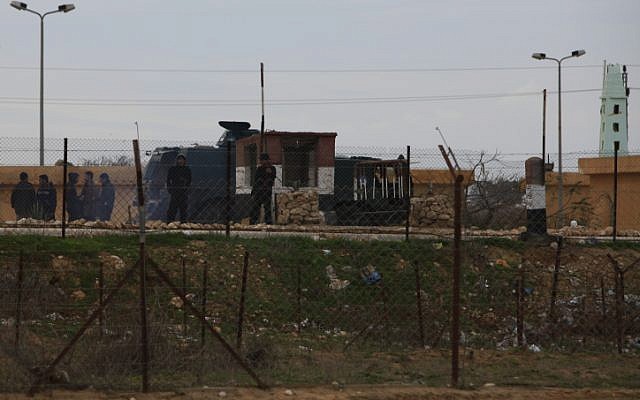 Egyptian soldiers stand along the border with Israel (photo credit: Tsafrir Abayov/Flash90)