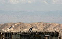 A worker at a construction site in the West Bank settlement of Maaleh Adumim in March 2011 (Kobi Gideon/Flash90)