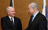 Robert Gates (left) with Benjamin Netanyahu in 2011 (photo credit: Amos Ben Gershom/GPO/Flash90)