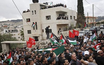 Incendiary neighborhood. Hundreds of Palestinians at the funeral of a 17-year-old from Silwan, killed during clashes with Israeli forces there last May. (photo credit: Miriam Alster/Flash90)