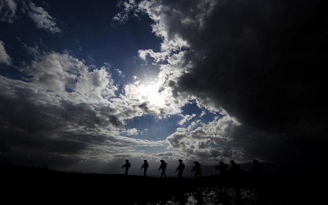 Golani soldiers during an exercise in the Golan Heights (photo credit: Abir Sultan/ Flash 90) Golani soldiers during an exercise in the Golan Heights (photo credit: Abir Sultan/ Flash 90)