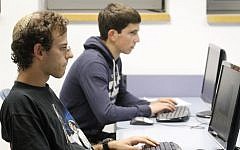 Students in Israel work via video-conferencing and the Internet with students in Washington University in St. Louis on projects for Israeli start-ups (illustrative photo; credit: Miriam Alster/Flash90)