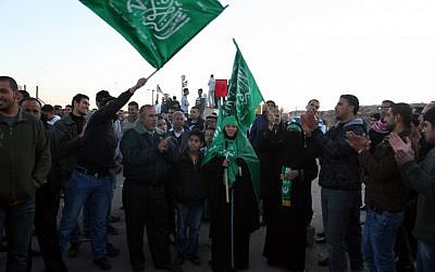 Palestinians awaiting the arrival of the second round of prisoners released in exchange for Gilad Shalit, December 2011 (photo credit: Issam Rimawi/ Flash90)