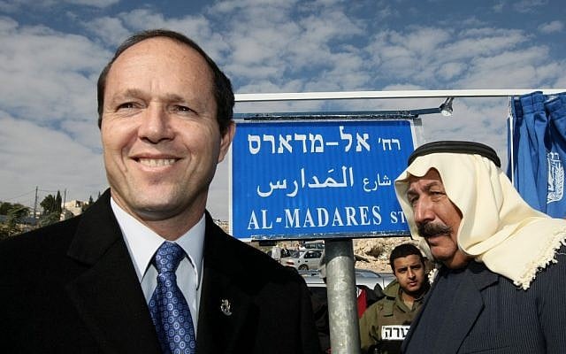 Then-Mayor Nir Barkat visits the East Jerusalem neighborhood of Issawiya to inaugurate a new road. (Kobi Gideon/Flash90)
