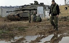 Israeli soldiers on the northern Israel-Gaza border took fire from terrorists in the Gaza Strip. (photo credit: Tsafrir Abayov/Flash90)