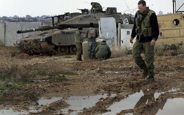 Israeli soldiers on the northern Israel-Gaza border took fire from terrorists in the Gaza Strip. (photo credit: Tsafrir Abayov/Flash90)