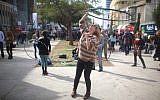 Young Israelis enjoy a street party on Rothschild Avenue in Tel Aviv (photo credit: Matanya Tausig/FLASH90)