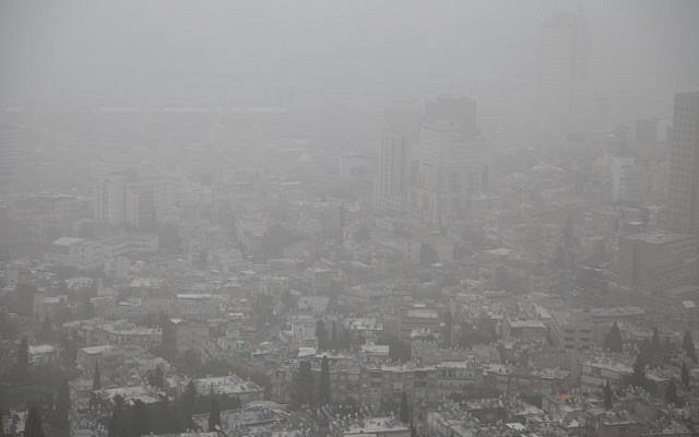 View of Haifa swathed in heavy haze. Feb 7 2012. (photo credit: Avishag Shaar Yashuv/flash90)