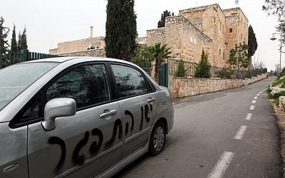 Graffiti reading "Price Tag" and "Death to Jesus" seen spray-painted outside the Monastery of the Cross in Jerusalem. Feb 7, 2012.  (photo credit: Yossi Zamir/Flash 90)