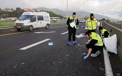 Rescue services at the scene of the crash (photo credit: Zaka/Flash90)