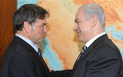 Prime Minister Benjamin Netanyahu congratulates Dr. Yehuda David upon his acquittal in France's highest court (photo credit: Moshe Milner/GPO/Flash90)