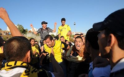 Fans of the Israeli soccer team Beitar Jerusalem (photo credit: Gili Yaari/Flash90)