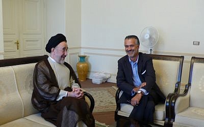 Hooman Majd (right) with Mohammad Khatami. (photo credit: Courtesy)