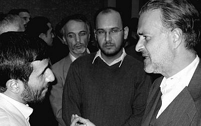 Hooman Majd with Mahmoud Ahmadinejad. (photo credit: Courtesy)