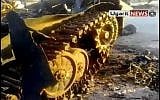 An army tank destroyed by the opposition in Idlib (photo credit: Ugarit News)