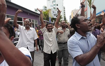 Supporters of former Maldivian president Mohamed Nasheed cheer after prayers in Male, Maldives in February (photo credit: AP/Eranga Jayawardena) Supporters of former Maldivian president Mohamed Nasheed cheer after prayers in Male, Maldives in February (photo credit: AP/Eranga Jayawardena)