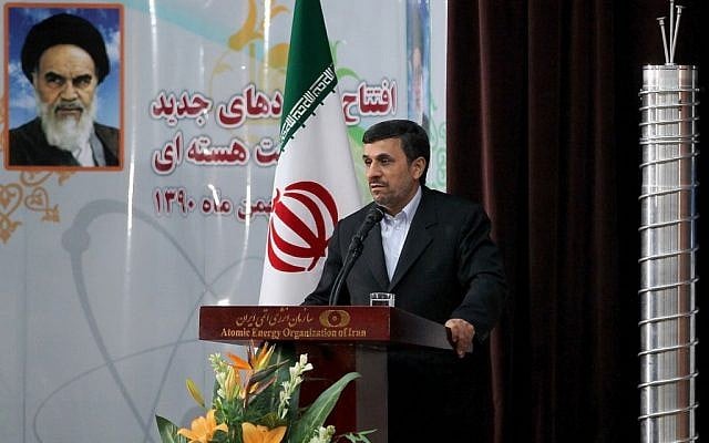 Iranian President Mahmoud Ahmadinejad addressing Tehran's research reactor center staff on Wednesday (photo credit: AP Photo/Iranian President's Office)