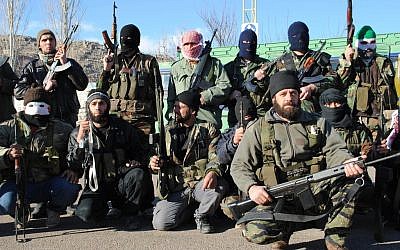 Syrian army defectors gather at the mountain resort town of Zabadani, Syria, near the Lebanese border, on January 20, 2012  (AP)