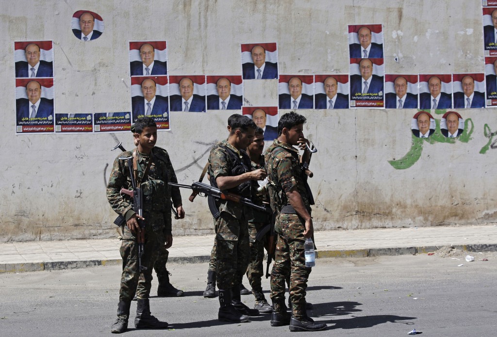 Soldiers stand during a pro-election rally in Sanaa on Monday (photo credit: AP/Hani Mohammed)
