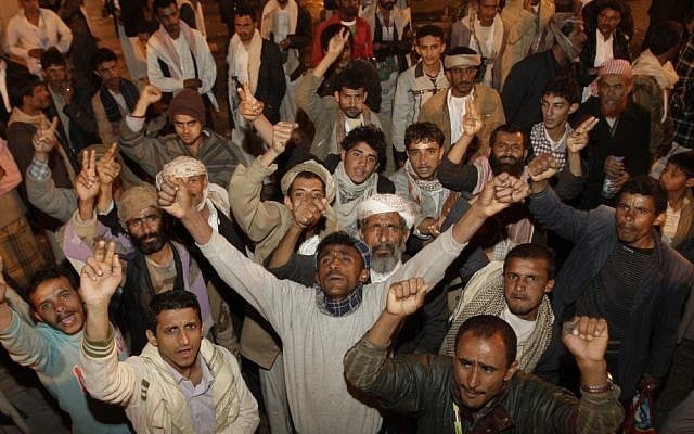 Demonstrators in Sanaa shout slogans as election results are announced on February 24, 2012 (photo credit: AP Photo/Hani Mohammed)