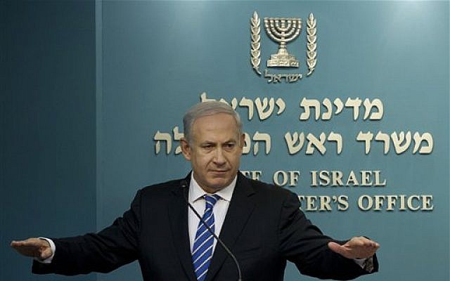 Prime Minister Benjamin Netanyahu speaks at a press conference in his office on Wednesday. (photo credit: AP/Bernat Armangue)