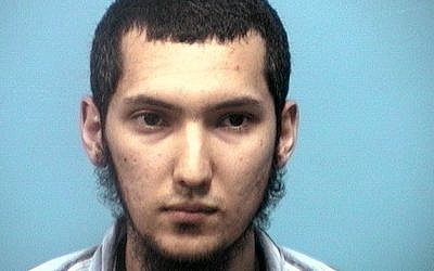 An undated handout photo provided by the Shelby County, Ala., Sheriff's Dept. shows 22-year-old Ulugbek Kodirov, who pleaded guilty in a plot to kill US President Barack Obama Friday in Birmingham, Ala. Kodirov was indicted last year on a charge of threatening Obama's life and illegally possessing an automatic rifle. Federal authorities added an additional terror charge Thursday. (photo credit: AP Photo/Shelby County Sheriff's Dept.)