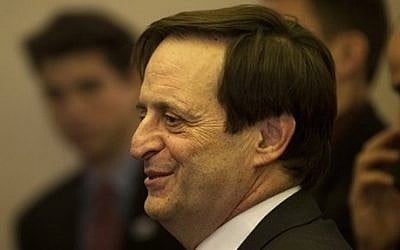 Dan Meridor speaks at a press conference in Jerusalem (photo credit: Sebastian Scheiner/AP)
