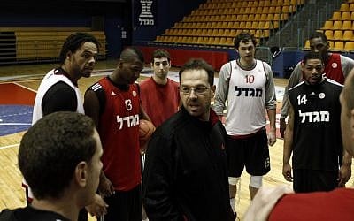 Coach Sharon Druker with the team (photo credit: Uri Lenz/Flash90)