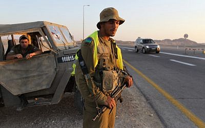 Soldiers block Route 12 in the aftermath of a coordinated terror attack in August (photo credit: Nati Shohat/Flash90) Soldiers block Route 12 in the aftermath of a coordinated terror attack in August (photo credit: Nati Shohat/Flash90)