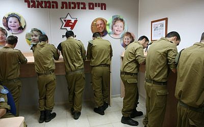 IDF recruits at a bone marrow registration (photo credit: courtesy Ezer Mizion)