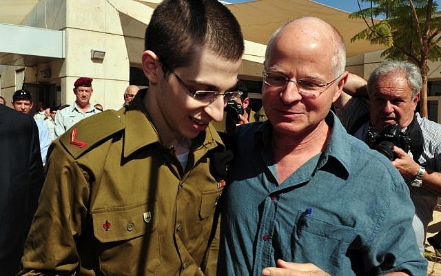 Gilad Shalit with his father Noam, on the day of his release from captivity (photo credit: Ariel Hermoni/ Defense Ministry /Flash90)