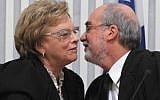 Retiring head of the Supreme Court Dorit Beinish kisses Asher Grunis who was appointed to be her successor. (photo credit: Yossi Zamir/Flash90)