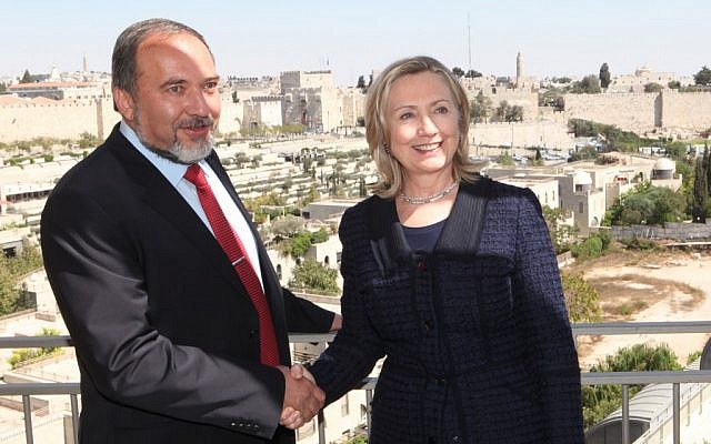 FM Avigdor Lieberman and Secretary of State Hillary Clinton shake hands during her  Sept. 15, 2010 visit to Jerusalem (photo credit: Yossi Zamir/Flash90)