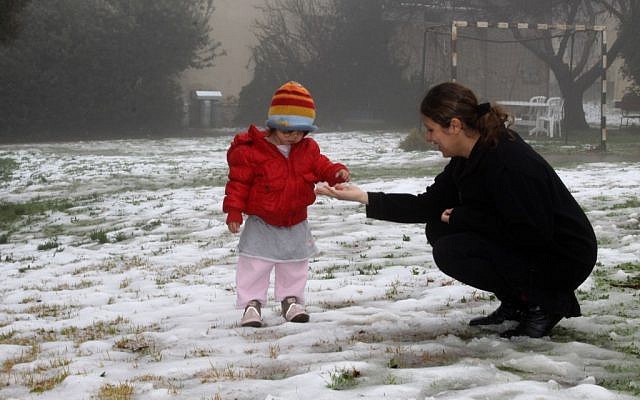 Residents of Migdal Oz in Gush Etzion woke up Sunday to a snowy day (photo credit: Gershon Elinson/Flash90)