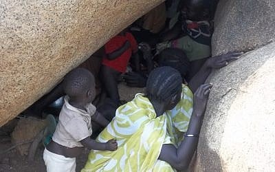Sudanese villagers use caves as makeshift bomb-shelters from government aerial strikes (photo credit: courtesy) 