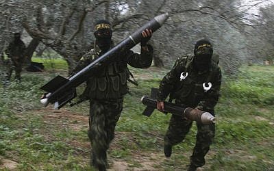 Illustrative: An undated photo of Islamic Jihad members in Gaza preparing to launch rockets toward Israel. (CC BY-SA Amir Farshad Ebrahimi, Flickr)
