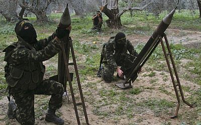 Islamic Jihad members firing rockets into Israel from the Gaza Strip. (photo credit: CC BY-SA Amir Farshad Ebrahimi, Flickr)