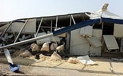 A farm building in southern Israel which was hit directly by a rocket. (photo credit: IDF Spokesman's Office)