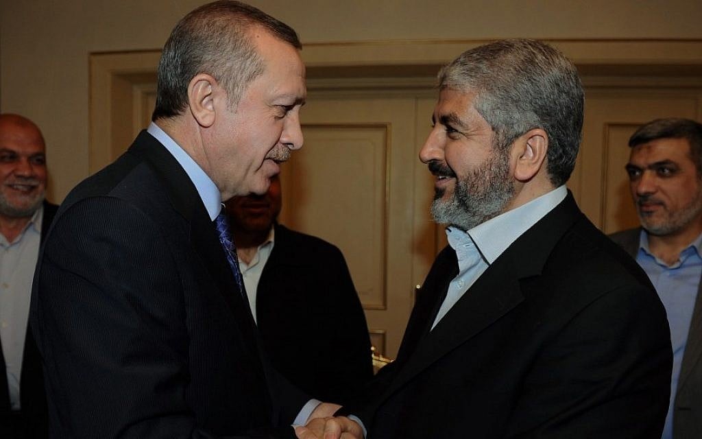 Then Turkish Prime Minister Recep Tayyip Erdogan meets with Hamas leader Khaled Mashaal in 2012. (Yasin Bulbul/AP)