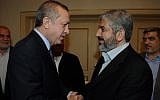 Then Turkish Prime Minister Recep Tayyip Erdogan meets with Hamas leader Khaled Mashaal in 2012. (Yasin Bulbul/AP)