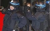 French police outside the apartment of Toulouse shooter Mohamed Merah in March (AP/Remy de la Mauviniere)