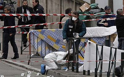 Police officers outside the Toulouse school in March 2012 (photo credit: AP/Bruno Martin)