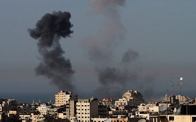 Illustrative photo of an explosion in Gaza City (photo credit: AP/Hatem Moussa)