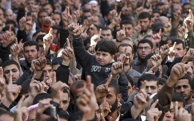 Palestinians rallying in Jabaliya Refugee Camp, demanding Egypt provide the Gaza Strip with electricity and diesel (photo credit: AP/Hatem Moussa)